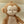 Peluche Macaco XL Little Dutch em poliéster macio, com braços e pernas compridos, tecido canelado e detalhes sensoriais para explorar.