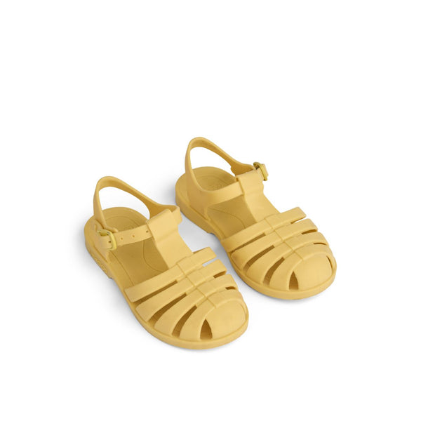 Sandálias bre pra bebé e criança da liewood em lemon yellow - amarelo