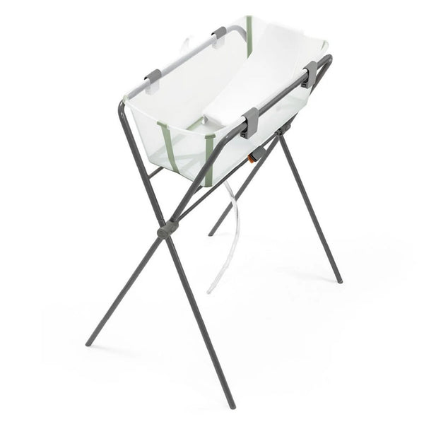 Conjunto Stokke® Flexi Bath® com banheira dobrável, suporte para recém-nascido e suporte para banheira, ideal para um banho confortável e seguro desde o nascimento. Transparent Green