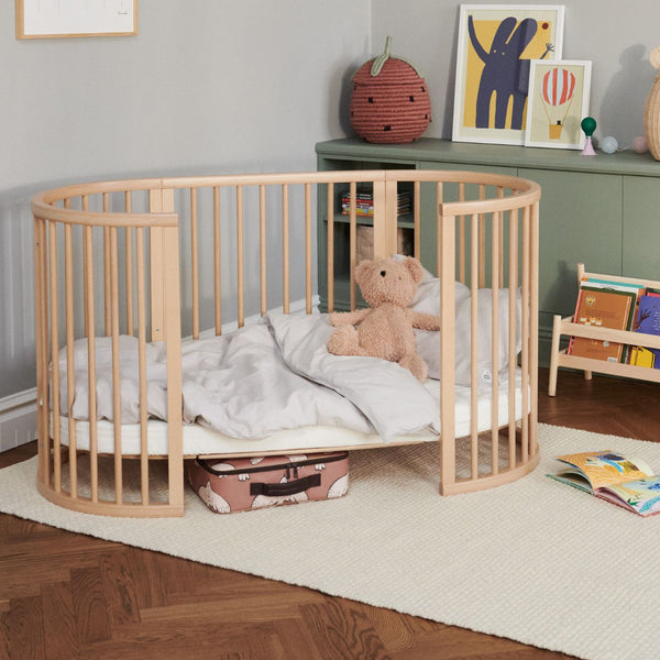 Berço evolutivo Stokke® Sleepi™ Bed oval em madeira de faia para bebé e criança cor natural