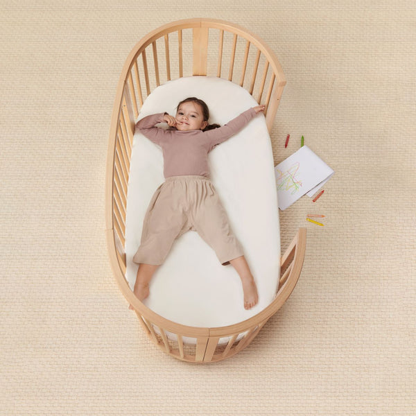 Berço evolutivo Stokke® Sleepi™ Bed oval em madeira de faia para bebé e criança cor natural