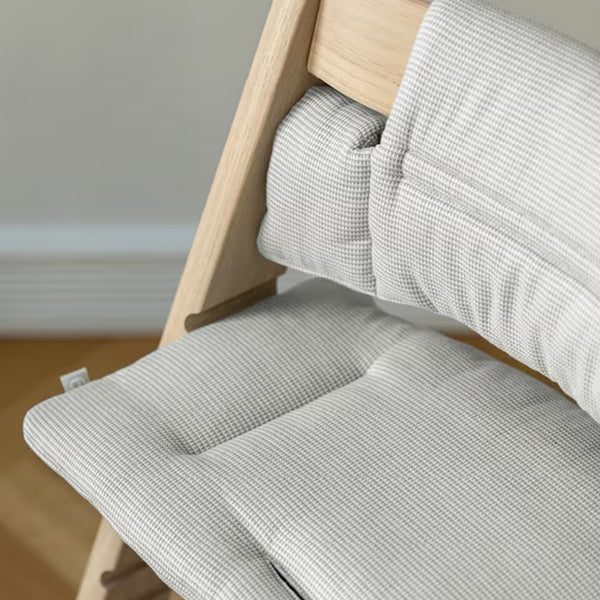 Almofada Stokke Tripp Trapp Classic Cushion em algodão 100% orgânico com enchimento reciclado, compatível com todas as cadeiras Tripp Trapp.
