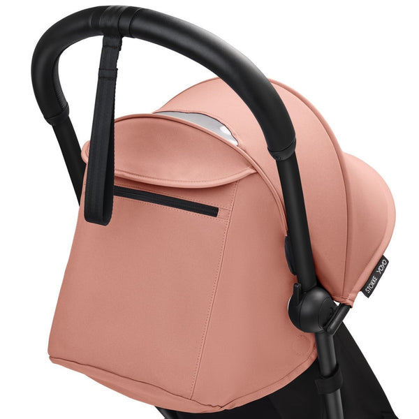 Carrinho Stokke YOYO³ compacto e ultraleve ideal para viagens e cabine de avião estrutura preta cor ginger