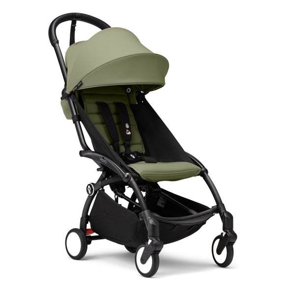 Carrinho Stokke YOYO³ compacto e ultraleve ideal para viagens e cabine de avião estrutura preta cor olive