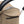 Carrinho Stokke YOYO³ compacto e ultraleve ideal para viagens e cabine de avião estrutura preta cor toffee