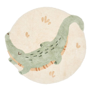 Tapete Crocodile infantil redondo em 100% algodão orgânico, com superfície suave e base antiderrapante para brincar, gatinhar e decorar o quarto.