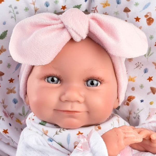 Boneca Tina Recém-Nascida de 40 cm feita à mão em Espanha, com conjunto de roupa, chupeta e saco-cama rosa com laço.