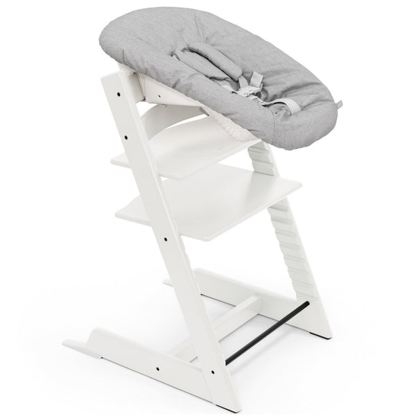 Cadeira Tripp Trapp® com Baby Set² e Newborn Set da Stokke®, solução evolutiva desde o nascimento que acompanha o crescimento da criança até à infância. Beech White