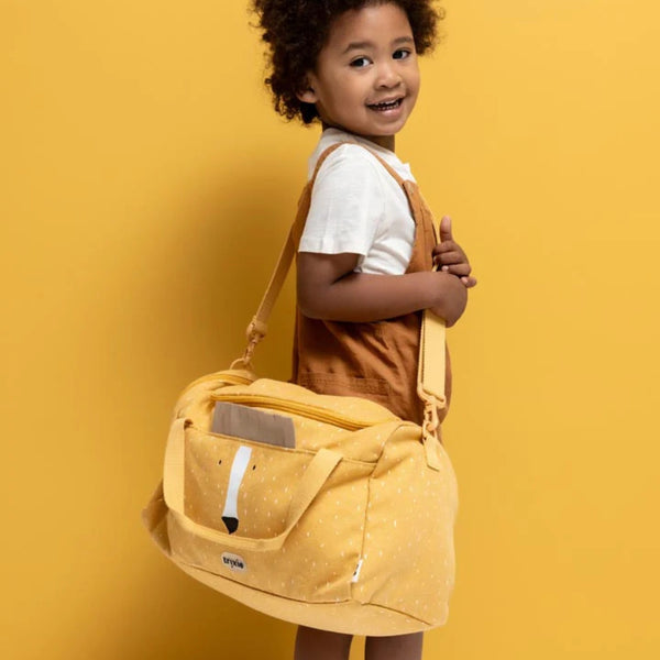 Saco de desporto infantil Trixie com compartimento espaçoso, bolso lateral com fecho, alça de ombro removível e materiais reciclados amarelo