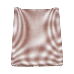 Colchão Muda Fraldas Praliné Vichy Walking Mum com espuma viscoelástica, capa impermeável, base antiderrapante e muda-fraldas adicional, ideal para mudar o bebé com conforto e segurança. Vermelho